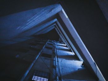 Directly below shot of spiral staircase of building