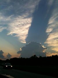 Scenic view of landscape against sky during sunset