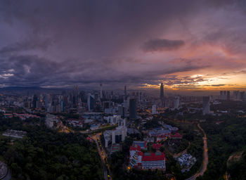 High angle view of buildings against sky during sunset