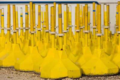 Close-up of yellow row on wall