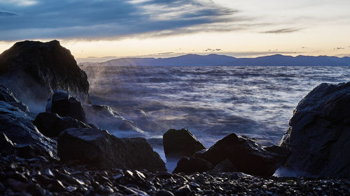 Scenic view of sea against sky during sunset