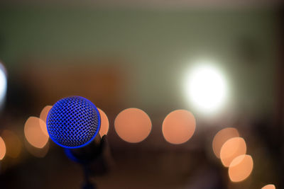 Close-up of illuminated lighting equipment