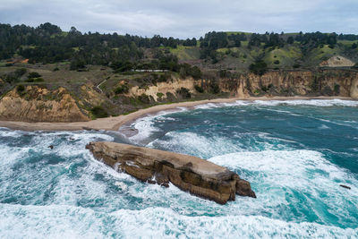 Greyhound rock and beach in background. california. usa