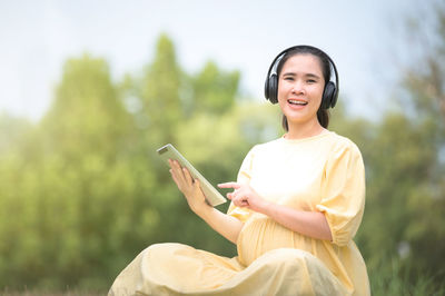 Young woman using mobile phone