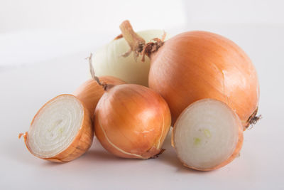 Close-up of oranges against white background