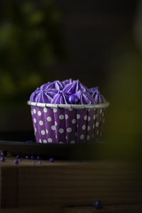 Close-up of blueberrie cupcake on table