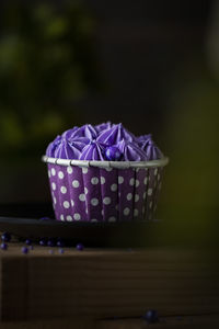 Close-up of purple box on table
