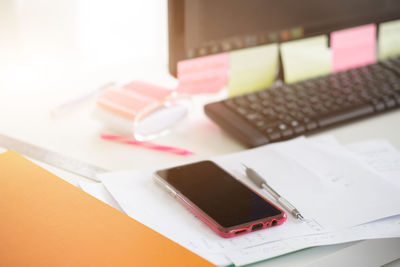 High angle view of mobile phone on table