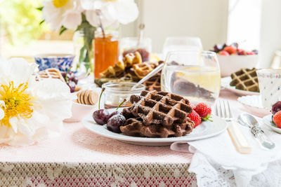 Close-up of cake served on table