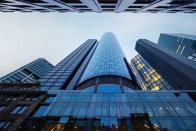 Low angle view of modern buildings against sky