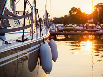 Boats moored at harbor