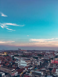 High angle view of townscape against sky with over population