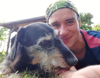 Portrait of man with dog