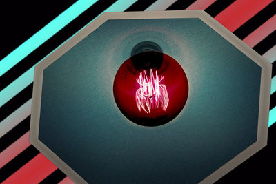 Close-up of illuminated road sign