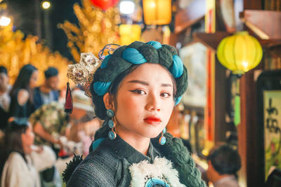 Portrait of young woman looking away