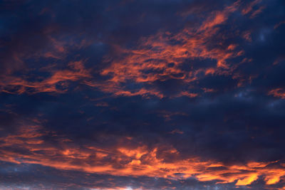 Low angle view of dramatic sky during sunset