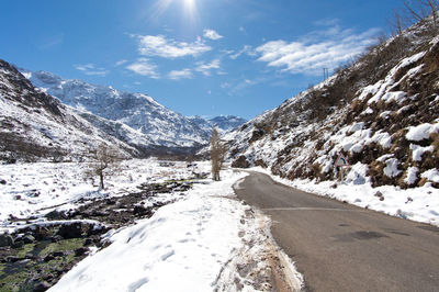 Scenic view of snow mountains against sky