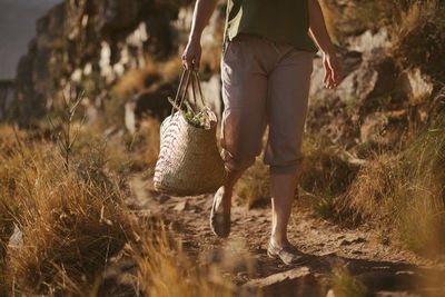 Low section of man walking outdoors