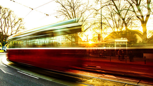 Blurred motion of train on road