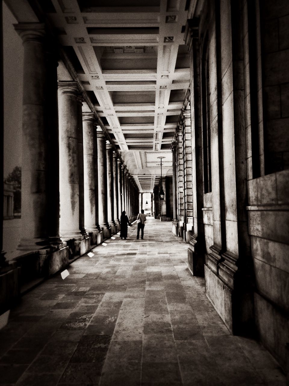 architecture, built structure, the way forward, diminishing perspective, architectural column, indoors, colonnade, vanishing point, corridor, building exterior, in a row, column, arch, history, incidental people, travel destinations, building, travel, city