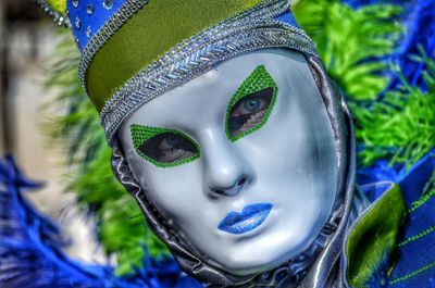 Close-up portrait of woman wearing mask