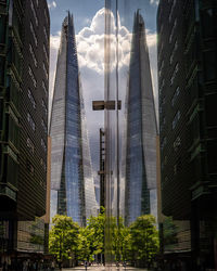 Low angle view of modern buildings in city