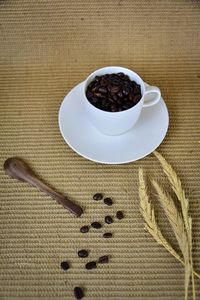 High angle view of coffee cup on table