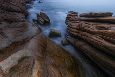 Panoramic view of rock formation in water