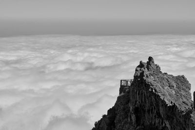 Low angle view of building by sea against sky