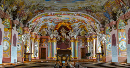 Statue in temple against building