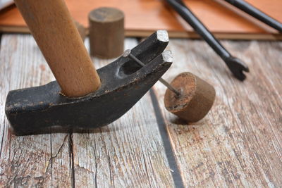 High angle view of tools on wooden table