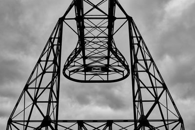 Low angle view of metallic structure against sky