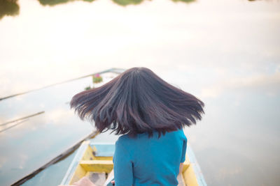 Rear view of woman looking at sky