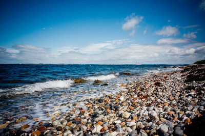 Scenic view of beach against sky