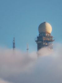 Low angle view of lighthouse against clear blue sky