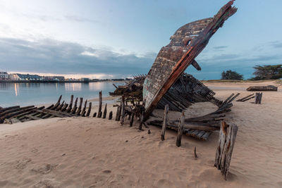 Wrecks of old boats in the boat cemetery of plouhinec in france in the brittany region