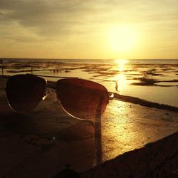 Scenic view of sea at sunset