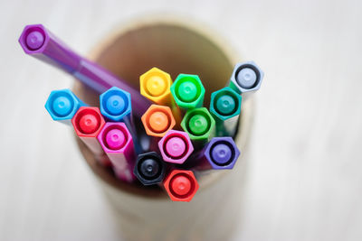 High angle view of multi colored pen on table