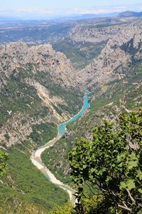 High angle view of road amidst mountains