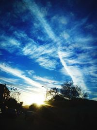 Low angle view of road at sunset