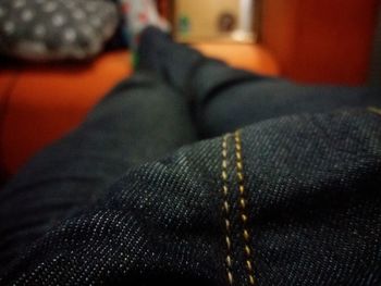 Low section of person at home