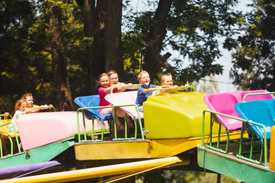 People at amusement park ride