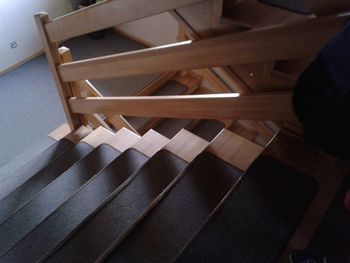 High angle view of chairs on table