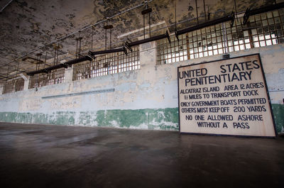 Text on wall in abandoned building