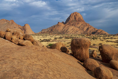 Scenic view of rocky mountains against sky