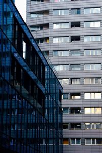 Low angle view of modern buildings in city