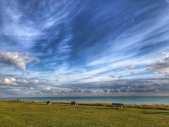 View of calm sea against cloudy sky