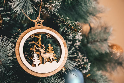 Close-up of christmas decoration hanging on tree