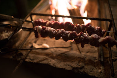 Close-up of meat on barbecue grill