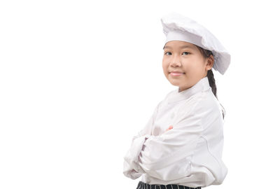 Portrait of a smiling girl over white background